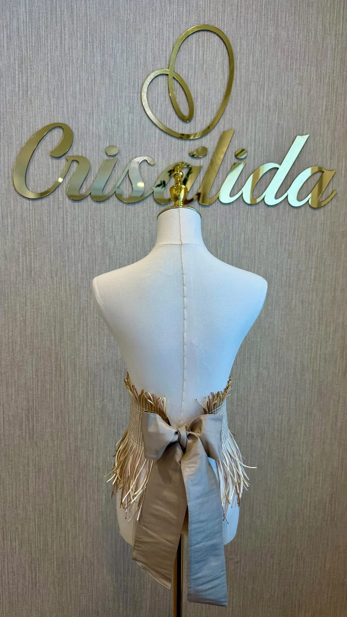 Cinturón de flecos beige